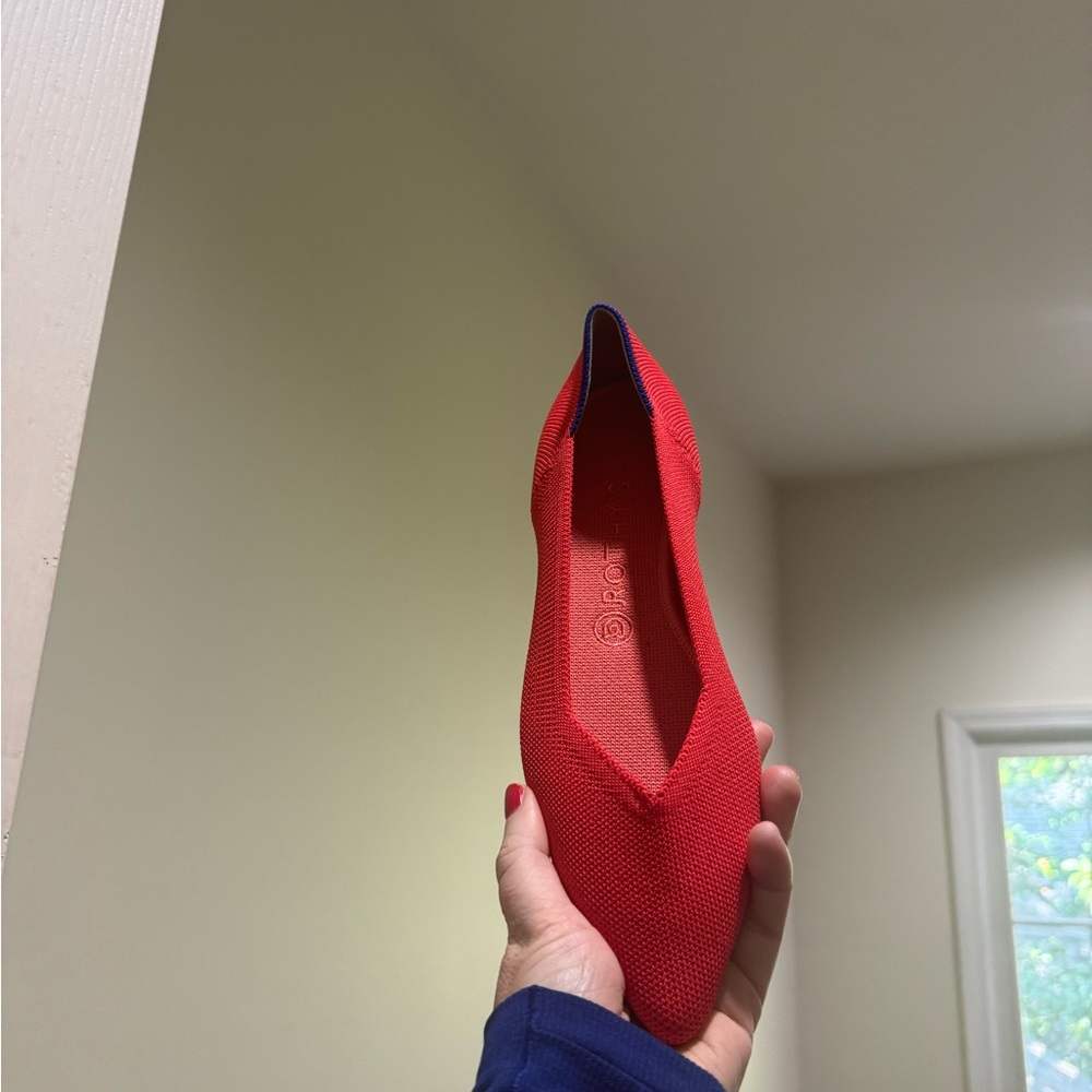 Rothys 9.5 fits like 8.5. color seems like more coral than red